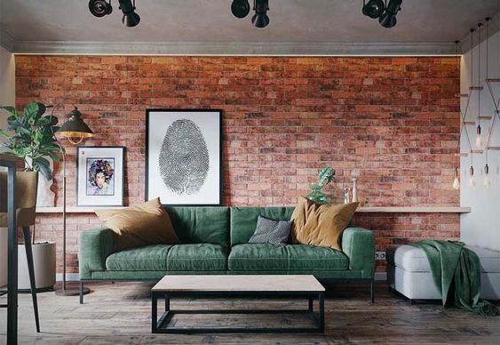 Decoração no estilo industrial para sala de estar, com paredes em tijolos e cimento aparente, com elementos decorativos proporcionando maior personalidade ao ambiente.